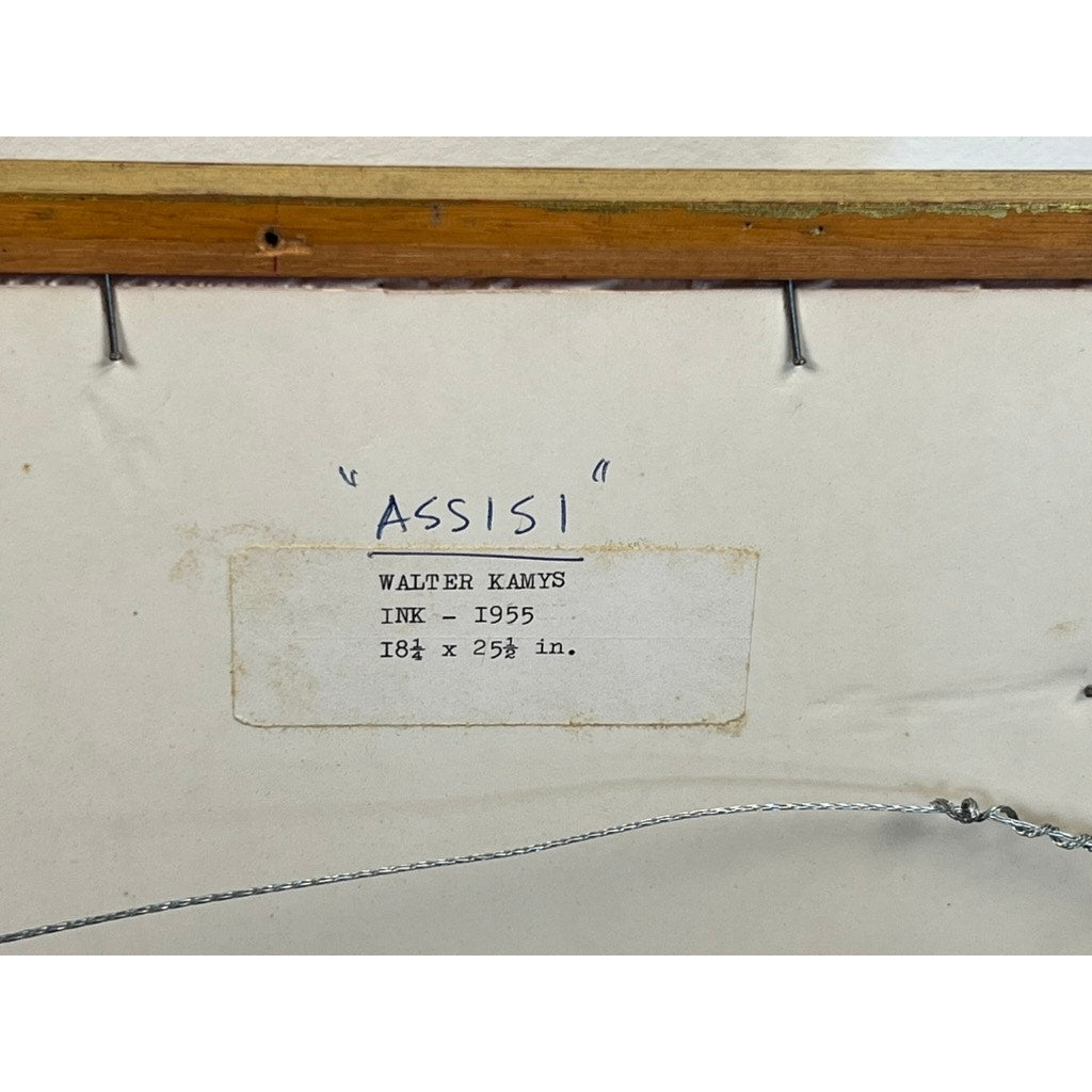 Close-up of the back of a framed Walter Kamys "Assissi" (1955, ink on paper, signed lower right) with a gallery label en verso; frame edge and hanging wire also visible.