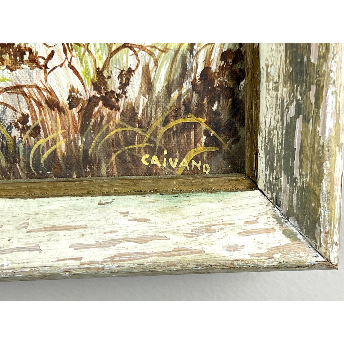 A close-up of the Oil on Board Painting “Summer Birches” by Rocco Caivano (Original Work) shows “CAIVANO” signed in yellow on the rustic landscape with grass and plants, set in a weathered white frame.