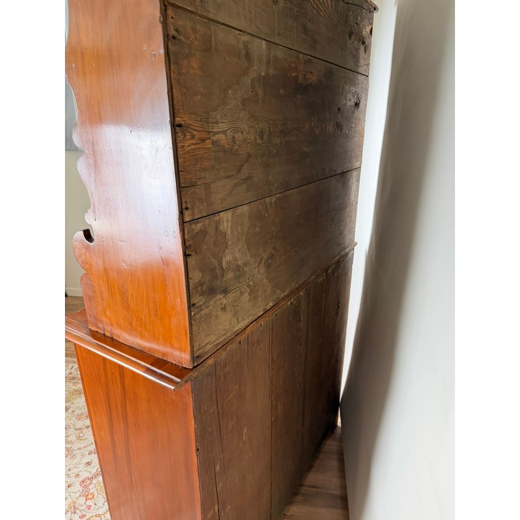 Side view of a Pennsylvania or Mid-Atlantic Cherry Open Pewter Cupboard, circa 1800–1830, showing its smooth, stained front and unfinished wood plank back.