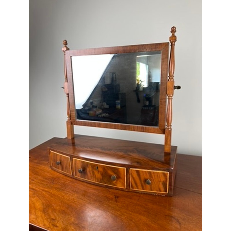 Antique Federal bow front mahogany shaving mirror with three drawers