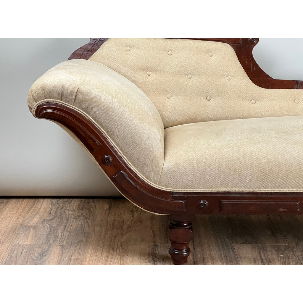 Eastlake Victorian fainting couch with turned legs and sloping back