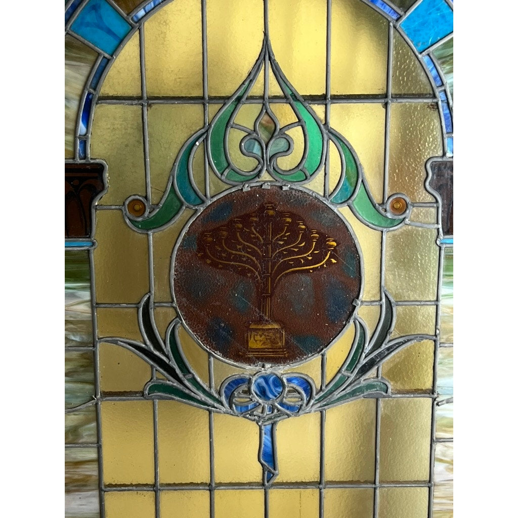 Stained glass window with tree motif medallion from Temple Beth El