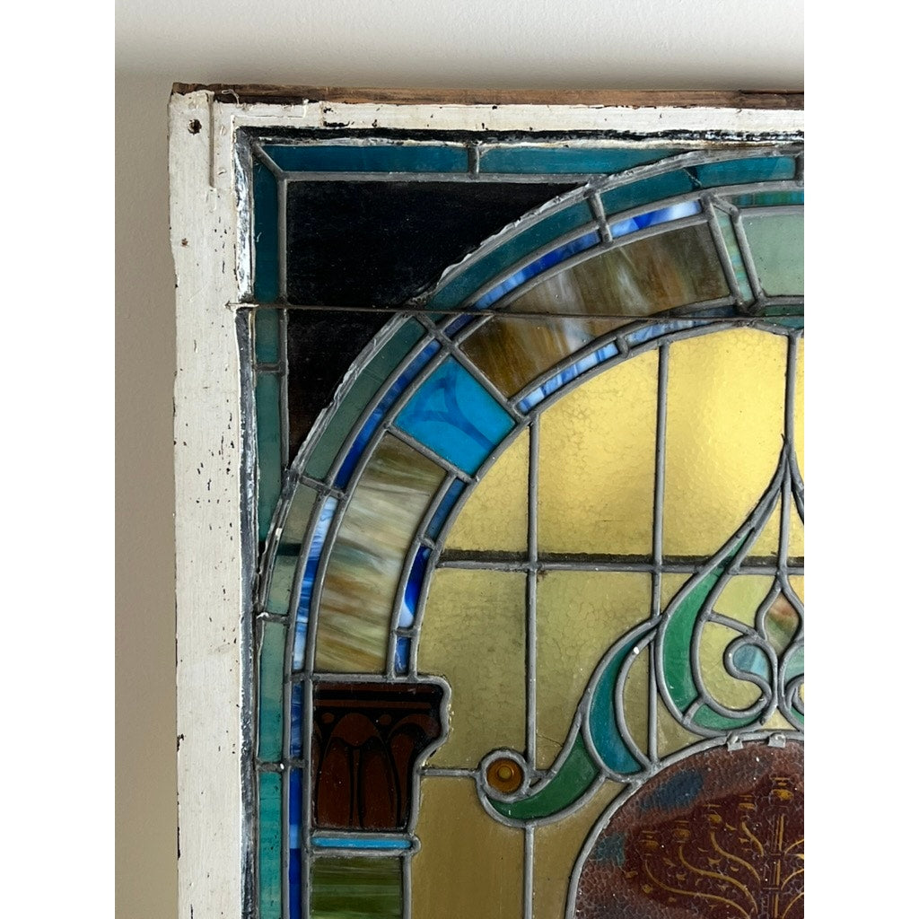 Stained glass window with tree motif medallion from Temple Beth El