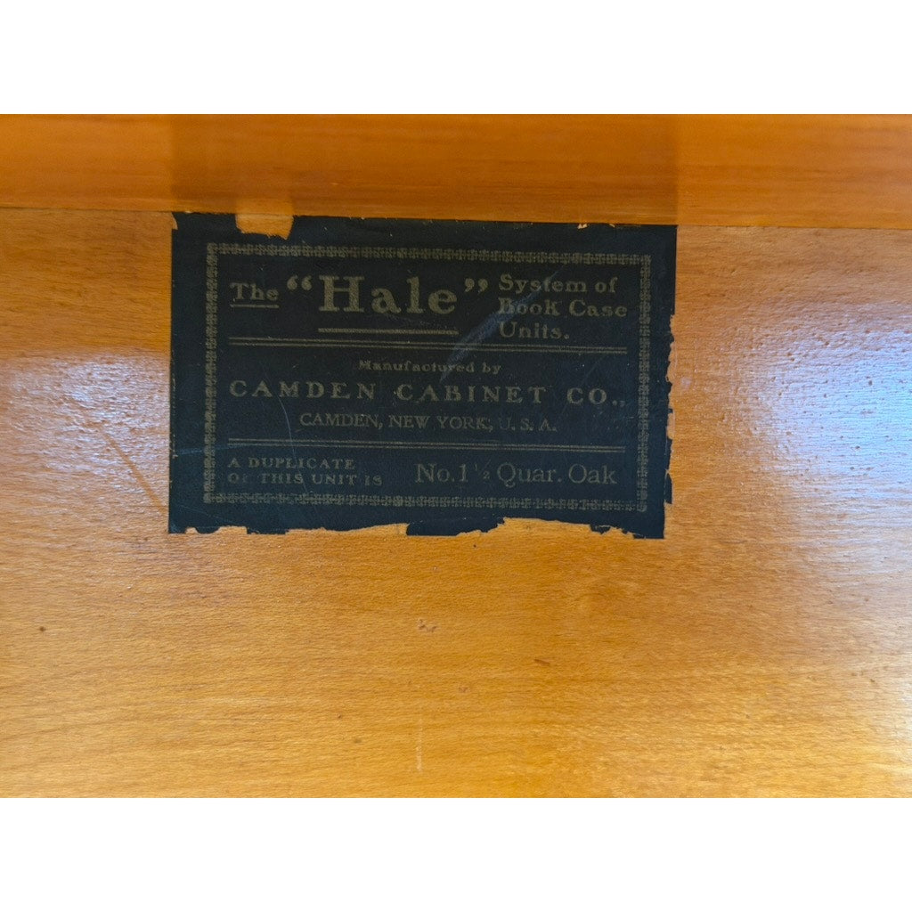 A black metal label affixed to the wood reads: The Hale System of Book Case Units, Camden Cabinet Company, Camden, New York, U.S.A., No. 1½ Quar. Oak—as found on this authentic Antique Hale System Quarter-Sawn Oak Five-Stack Barrister Bookcase, c. 1910, crafted by the Camden Cabinet Company from fine quarter-sawn oak.