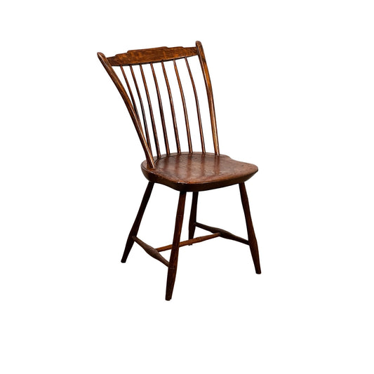 Antique Step Down Windsor Chair in Oak and Pine, early 19th century, featuring a curved backrest with seven vertical spindles, angled legs, and a contoured seat, displayed on a white background. Brand unknown.