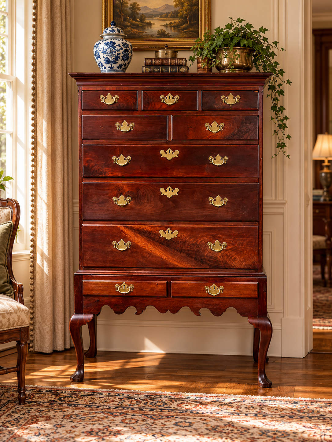 An Antique Queen Anne Walnut Chest on Frame with Drake Feet Probably Irish c. Late 18th Century, featuring a tall, dark antique walnut frame with cabriole legs and brass hardware.