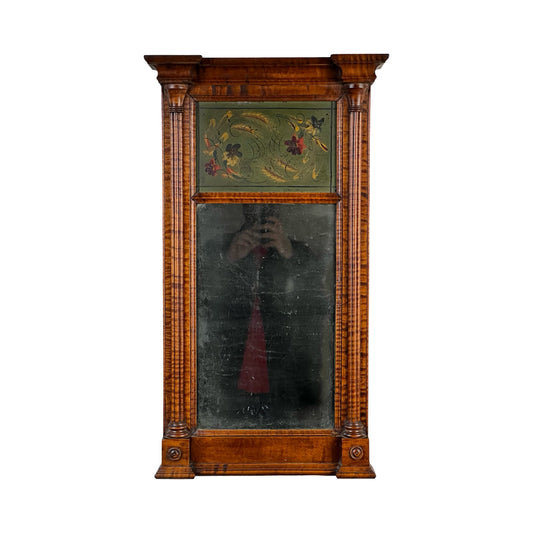 Fine Antique Federal Period Tiger Maple Two Panel Mirror c. 1820 with carved frame, columns, rectangular glass, and decorative painted floral panel. Early 19th-century American craftsmanship; a person’s reflection can be seen.