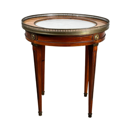 An early 20th-century antique French Louis XVI-style mahogany bouillotte table with a marble top, inspired by classic neoclassical elegance. Brand: Unknown.