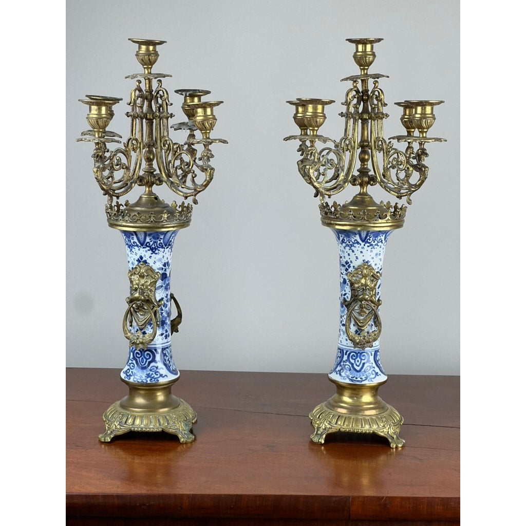 Boch Dutch Delft porcelain and gilt bronze candelabra with lion masks