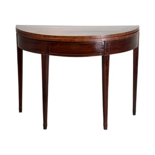 An English George III Mahogany and Satinwood-Inlaid Demilune Games Table, circa 1790–1810, featuring a mahogany finish, four tapered legs, and light wood inlay.
