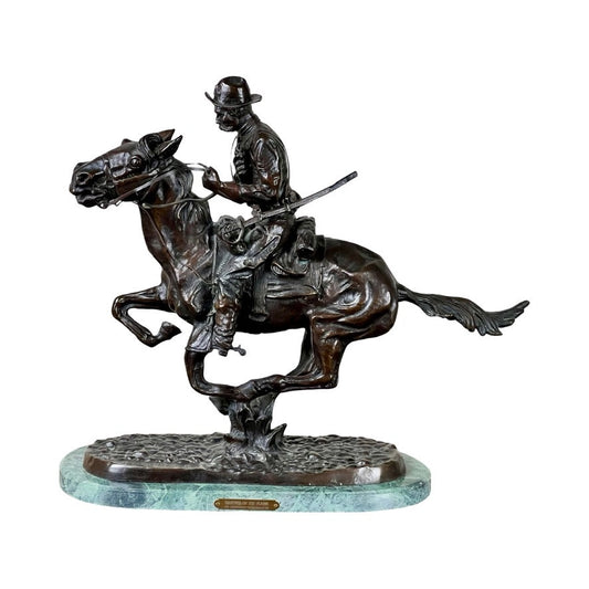 After Frederick Remington “Trooper of the Plains” Lost Wax Bronze Sculpture (1909) depicts a cowboy on a galloping horse with rifle, mounted on an oval green marble base with front nameplate. Brand: None/Unknown.
