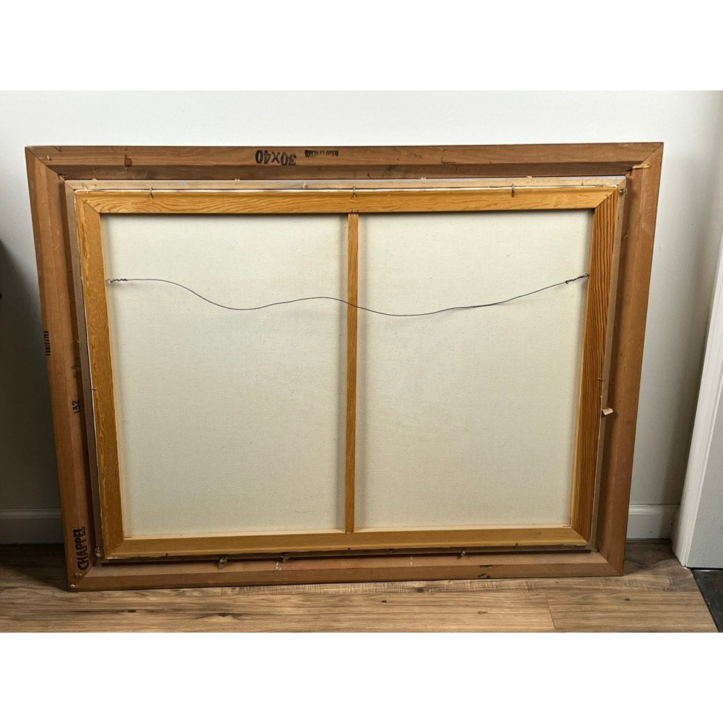 A large, empty wooden picture frame with a hanging wire leans against a wall, its backing visible—once it displayed “Barque Archibald Russell 1905,” a signed 1984 oil on canvas painting by John Richard Perry.
