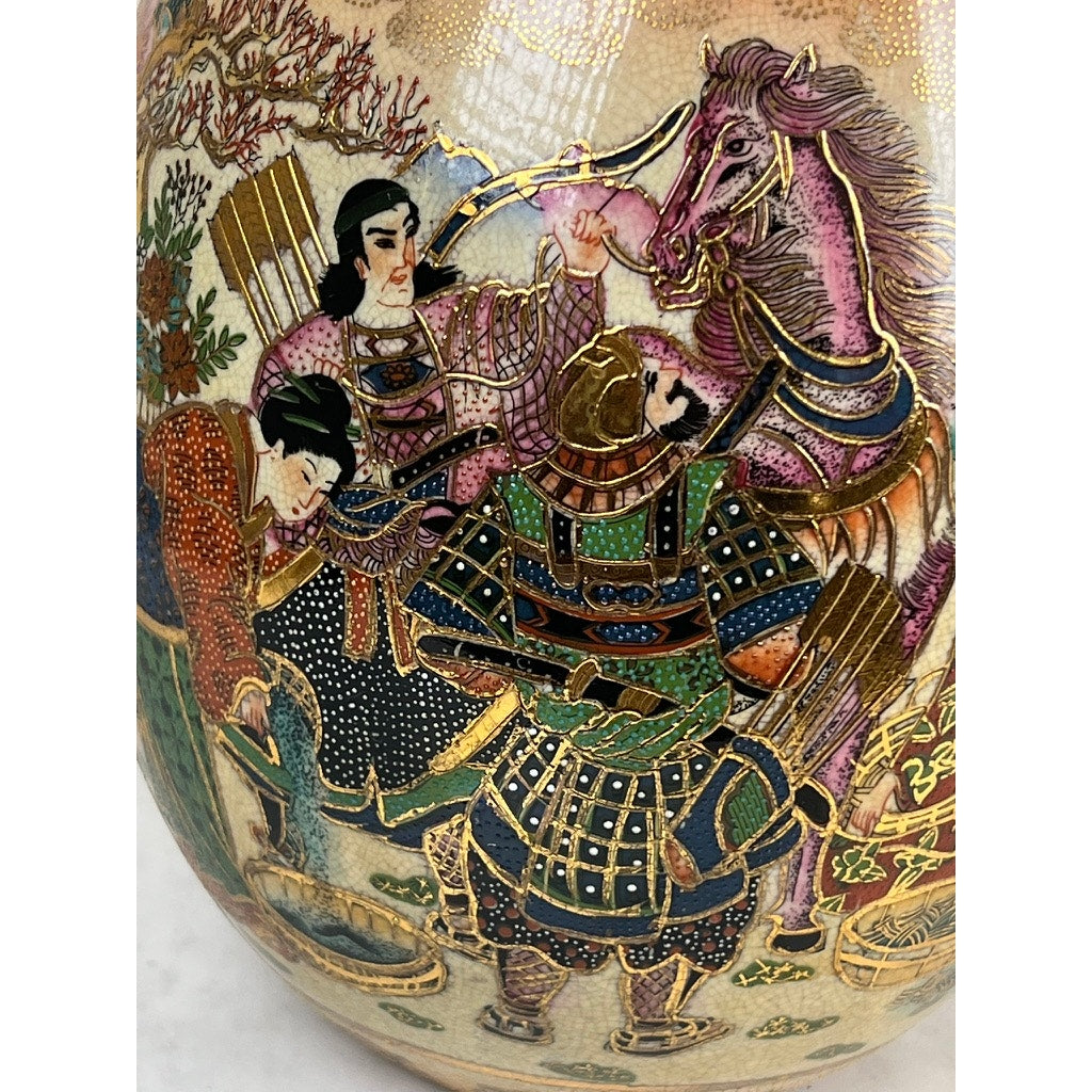 This large antique Satsuma porcelain egg features vibrant artwork of three armored warriors and a horse with gold accents, samurai motifs, and traditional Japanese-style patterns—a prized Asian export collectible.