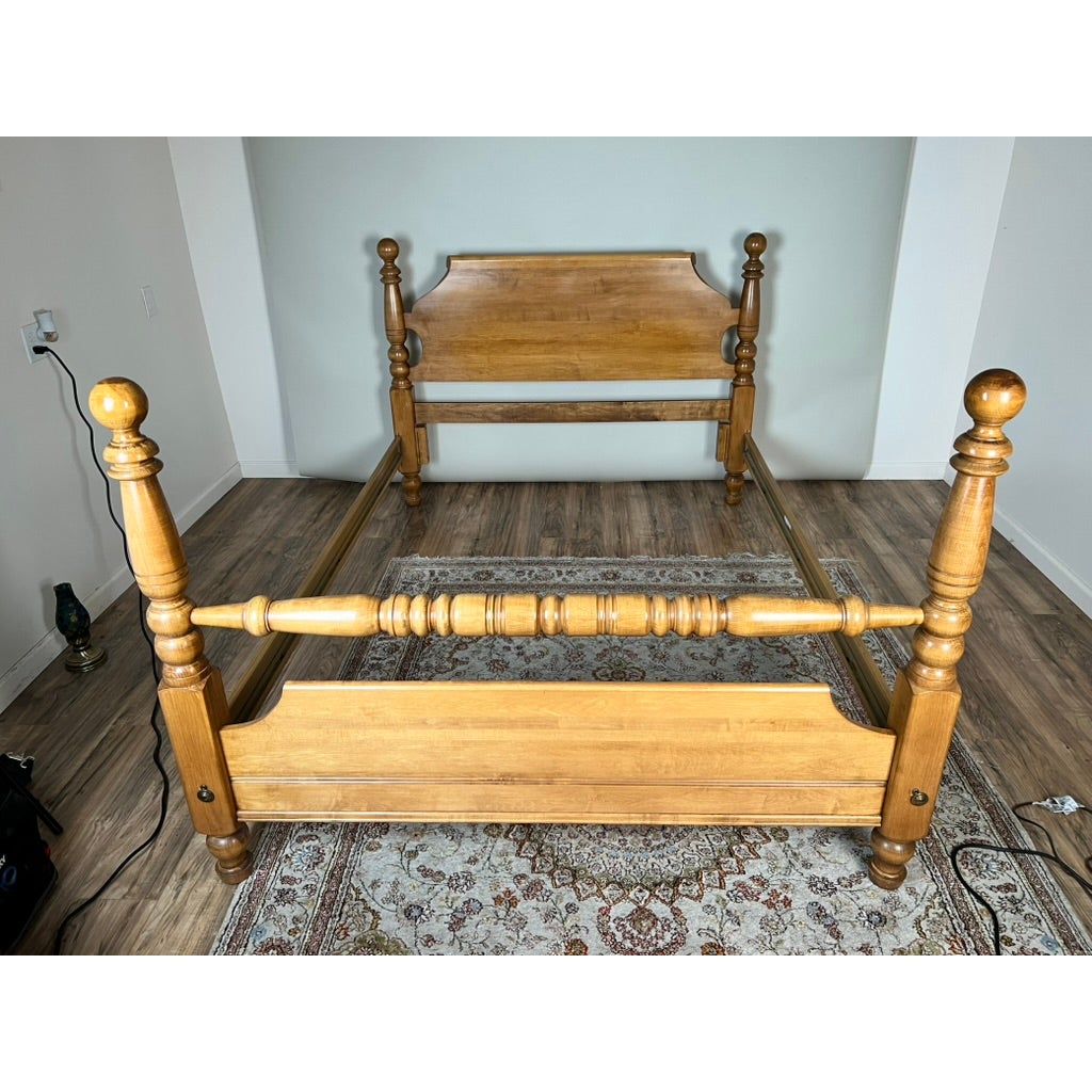 Vintage Rock Maple Cannonball Queen Size Bed frame in a vintage cannonball style, featuring tall, rounded posts with a matching headboard and footboard.