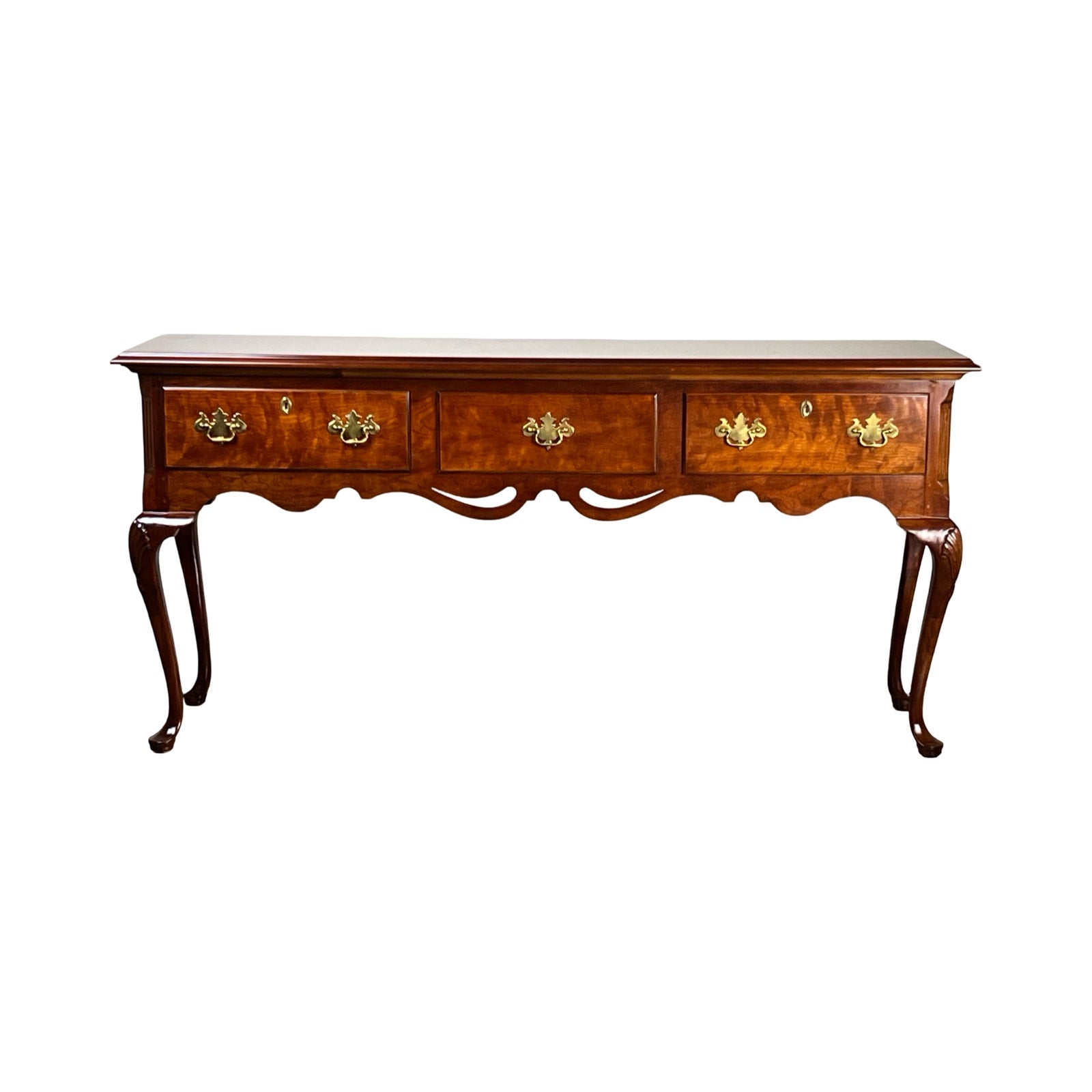 The Vintage Solid Cherry Queen Anne Style Sideboard by Henredon features four drawers, ornate brass handles, elegant cabriole legs, and a polished dark brown finish, shown against a white background.