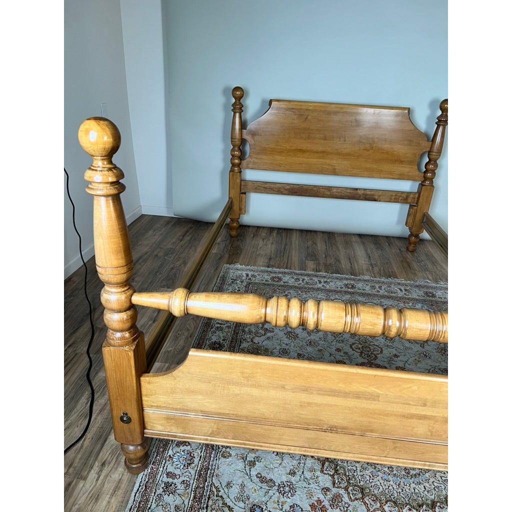 A Vintage Rock Maple Cannonball Queen Size Bed with turned posts, ball finials, and a solid maple frame.