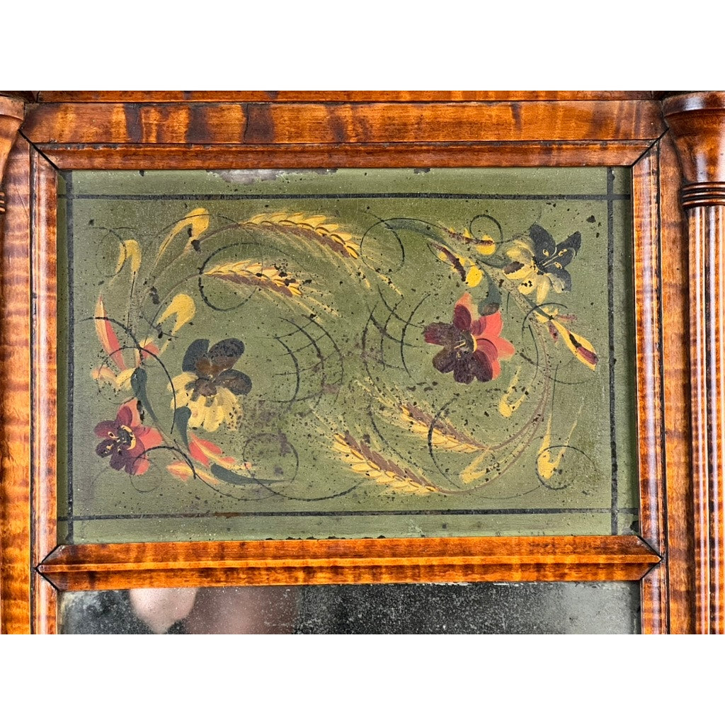 A Fine Antique Federal Period Tiger Maple Two Panel Mirror c. 1820 featuring rectangular glass with a hand-painted floral design in yellow, red, and purple with green leaves and swirls, set in a polished tiger maple frame. Brand: Unknown.