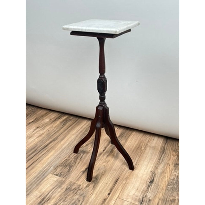 An Antique Victorian Marble Top Plant Stand (late 19th century) with a square white marble top and three curved legs stands on a wooden floor against a plain light background. Brand: None/Unknown.