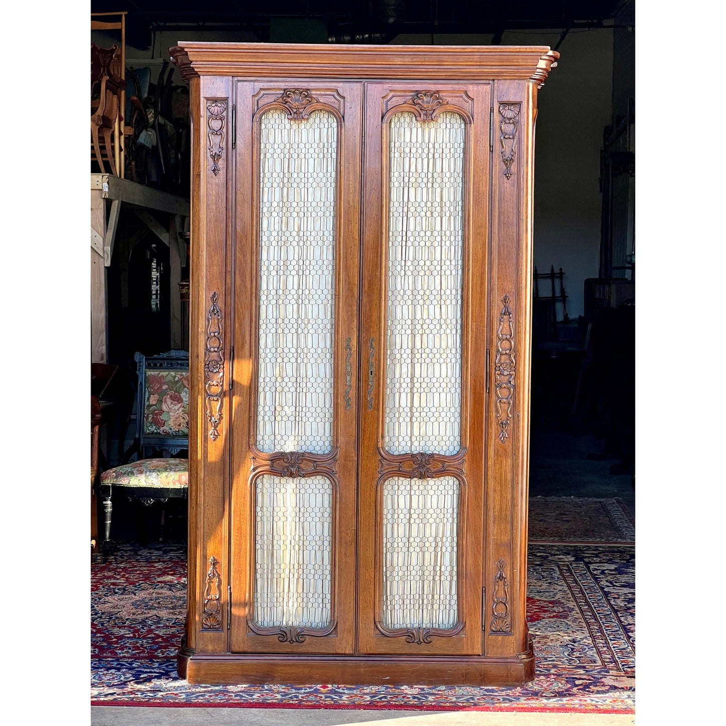 Vintage 20th Century Carved Walnut Louis XIV Style Armoire with Custom Upholstered Interior