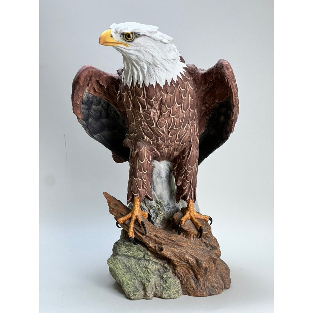 Rare Kaiser Porcelain American Bald Eagle Sculpture, Limited Edition No. 12/200 by Kaiser, W. Germany—features an eagle with outstretched wings on a rocky branch, detailed brown feathers, yellow beak, and white head against a light background.