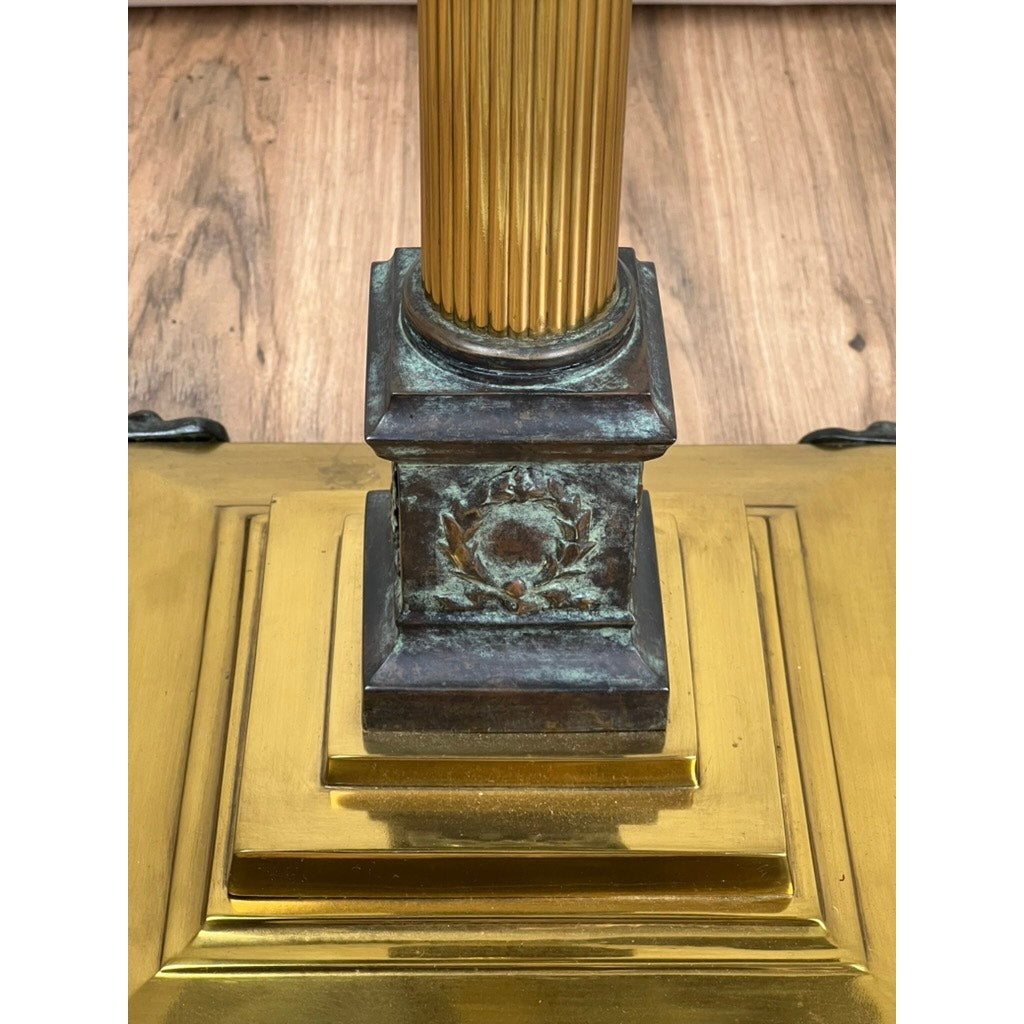 Arts and Crafts style floor lamp by Maitland Smith with paw feet base