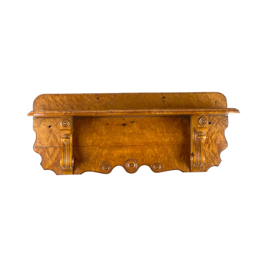 Antique Victorian Birdseye Maple Wall Shelf, late 19th century, featuring ornate scrollwork and carved details in light brown wood, reminiscent of period decor; brand unknown, shown isolated on white.