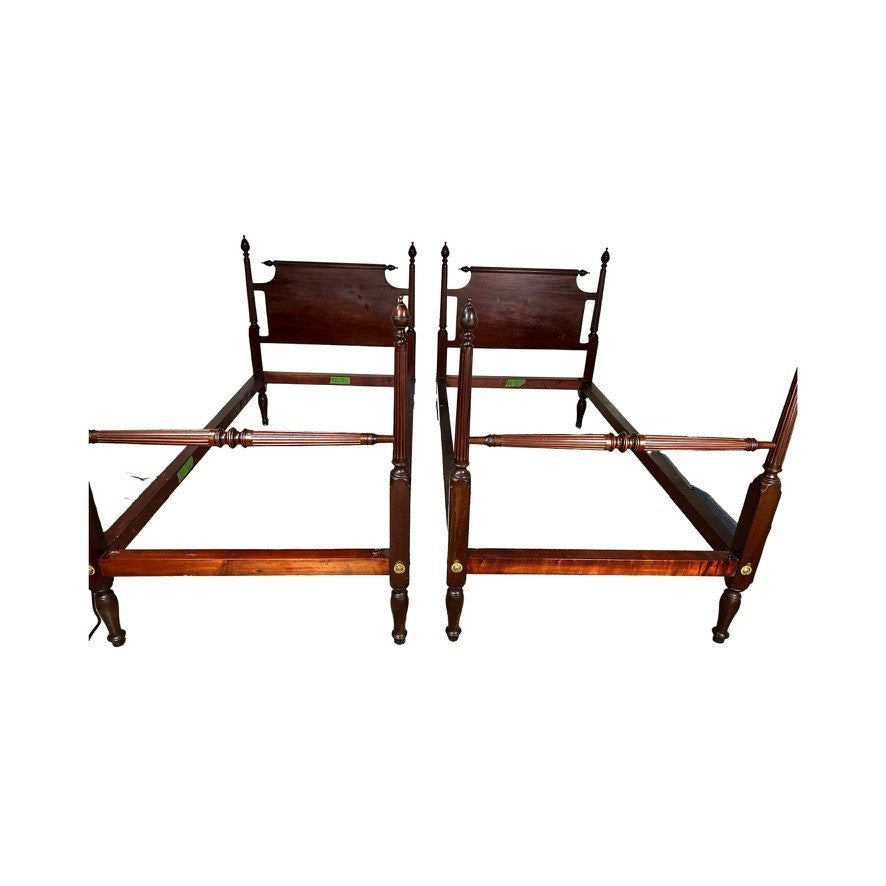 Vintage Pair Centennial Solid Mahogany Twin Four Poster Beds, c. 1940, featuring dark wood spindle headboards and finials, are shown side by side without mattresses or box springs against a white background. Brand: None/Unknown.