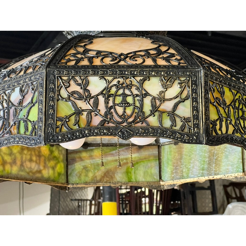 Early 20th century hanging lamp with floral metalwork and slag glass shade