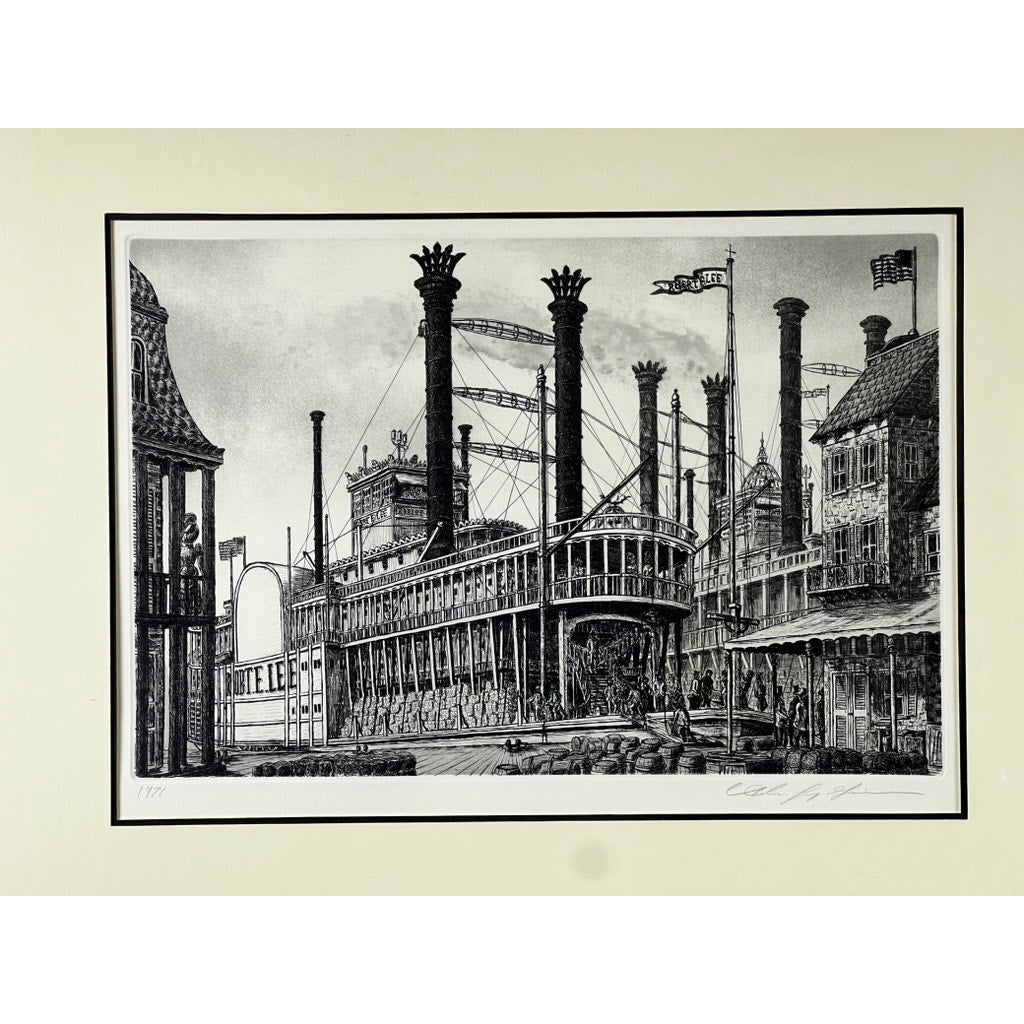 Framed etching “Steamboat Robert E. Lee” by Alan Jay Gaines depicts a lively riverside scene with the iconic steamboat docked, people along the waterfront, and flags flying—capturing classic charm in black and white. Brand: None/Unknown.