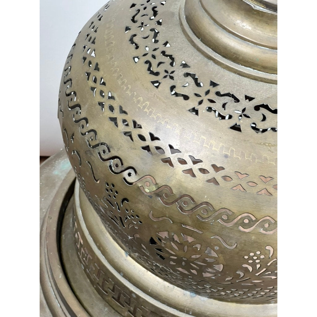 Close-up of an Antique Venetian Brass Bell Room Heater Brazier (19th Century) with intricate cut-out patterns and decorative engravings; its metallic, slightly tarnished surface suggests it was used as a unique room heater.