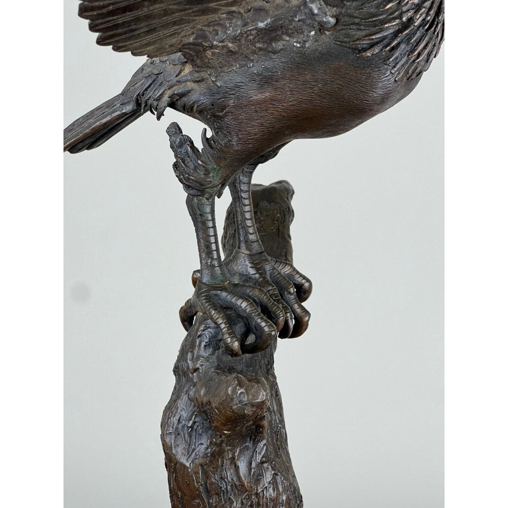 Detail of chased plumage on Japanese Meiji bronze hawk sculpture
