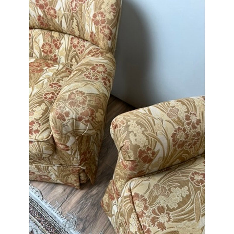 Custom upholstered vintage club chairs with floral patterned fabric