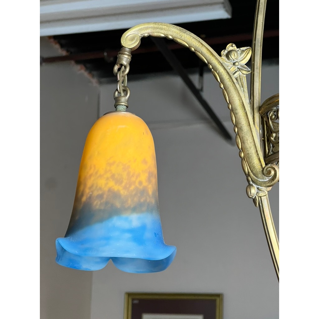 The Vintage Muller Frères Lunéville French Brass and Art Glass Four Light Chandelier features elegant Art Nouveau glass by Muller Frères Lunéville, inspired by vintage French designs.