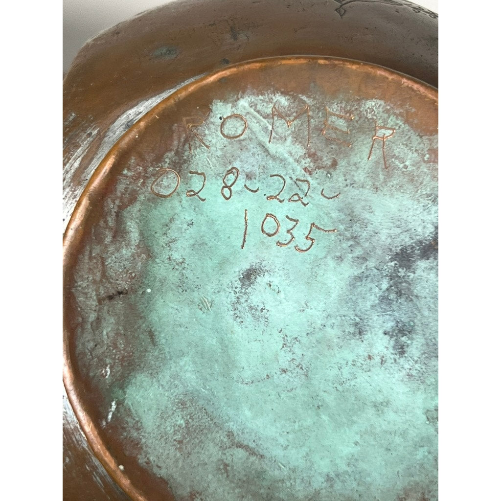 Close-up of the base of an Antique Qajar Persian Copper Engraved Ewer c. 19th Century, displaying a greenish patina and hand-engraved markings "ROMER 028-22c 1035," reflecting classic Islamic design influences. Brand: None/Unknown.