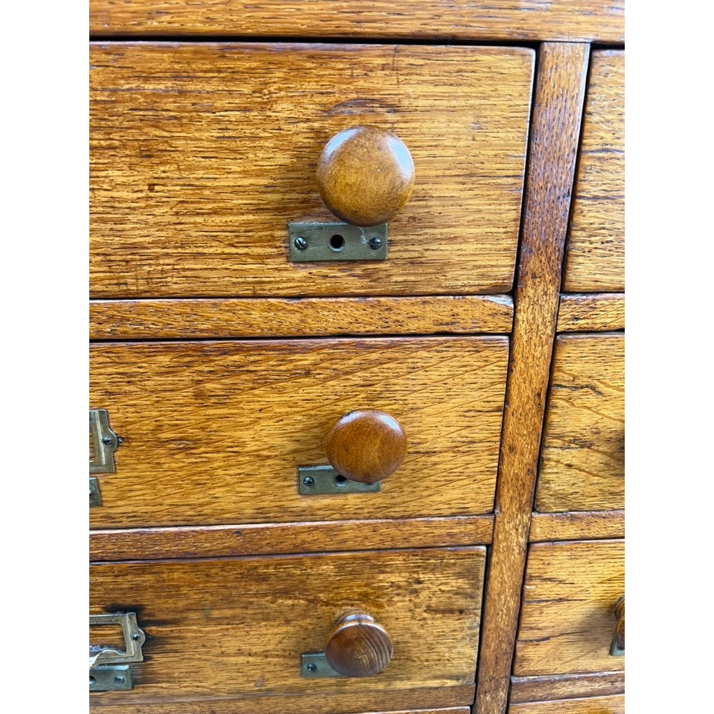 Oak multi-drawer file cabinet, antique office storage, early 20th century furniture.