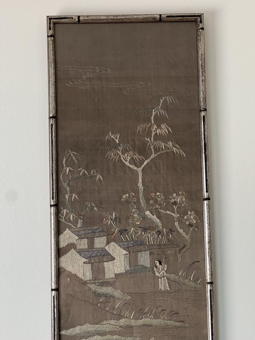 Antique Chinese Embroidered Panel on Silk c. Late 19th Century by Pearl City Antiques, featuring traditional buildings, trees, and a figure on silk within a wooden frame—an elegant decorative textile art piece for display.