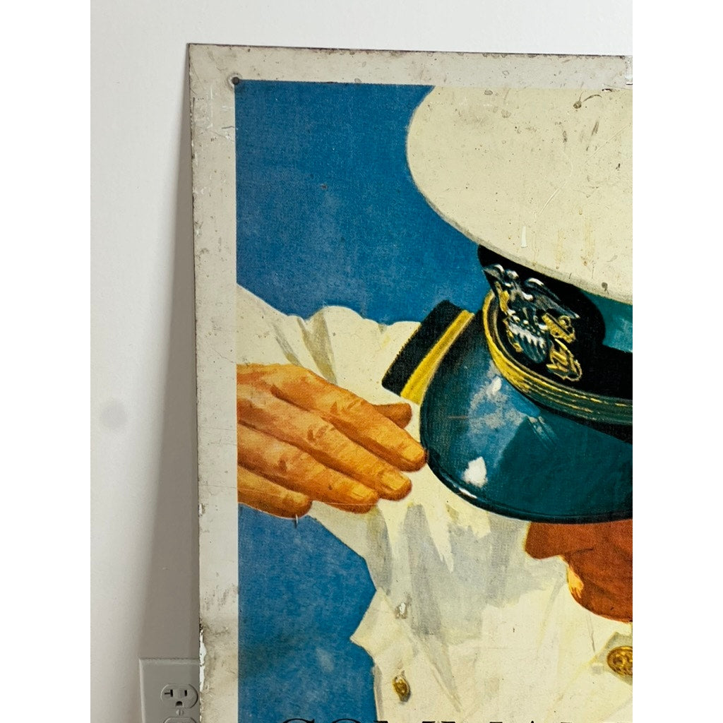 Partial view of an original Vietnam Era double-sided U.S. Navy recruiting tin sign by artist Lou Nolan, featuring the USS Saratoga—a person in a white naval uniform salutes, with their arm and part of the head visible on a blue background.