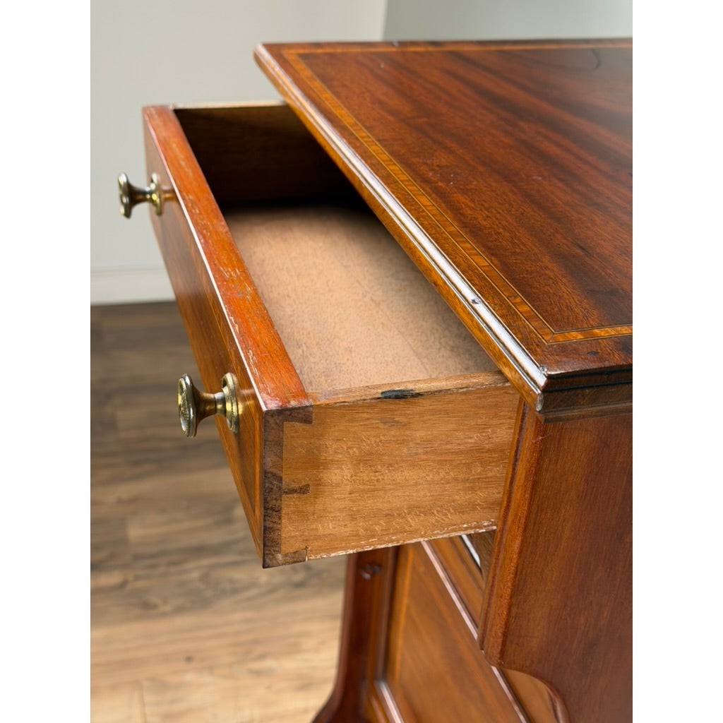 An Antique English Mahogany Inlaid Shaving Stand with Adjustable Mirror, c. 1880–1900, featuring an open drawer and brass knob handles.