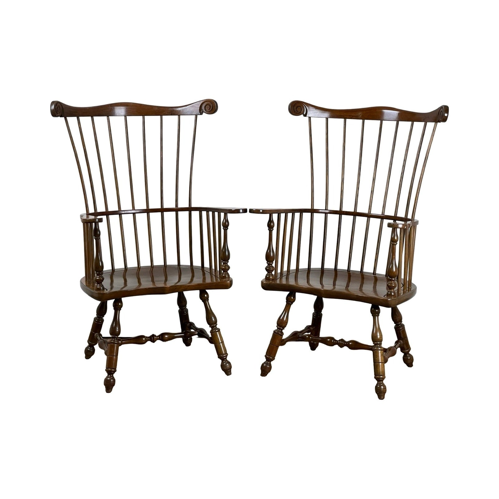 Pair of Stickley cherry Windsor chairs with tall spindle backs and scrolled crests