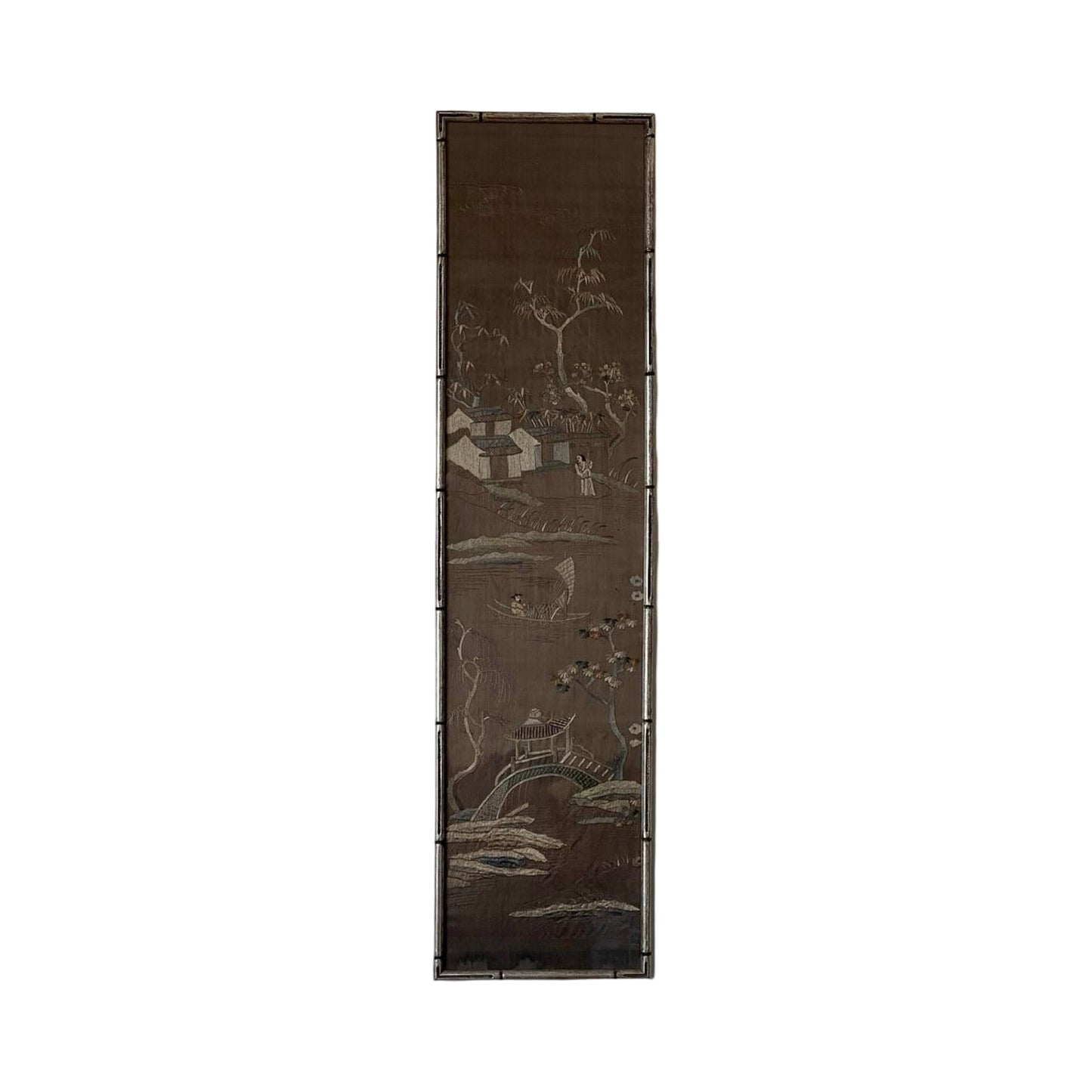 The Pearl City Antiques Antique Chinese Embroidered Panel on Silk (late 19th c.) features detailed Asian-style houses, trees, and landscapes in muted earthy tones on a dark brown background. This vertical textile is rich in traditional motifs.
