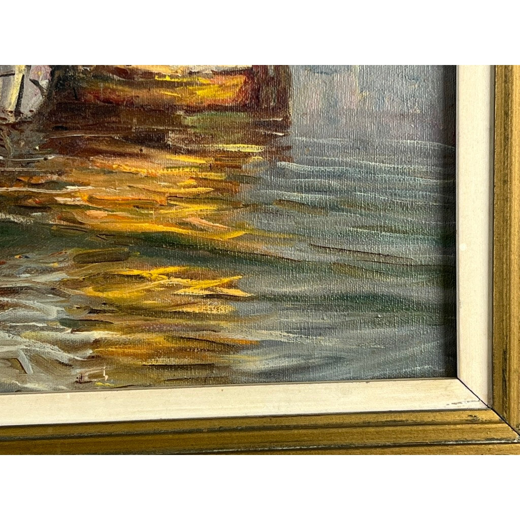 Close-up of "Two Ships Off the Beach," a framed oil on canvas with textured brushstrokes depicting water and colorful reflections, signed lower left. Set in a gold and cream-colored wooden frame. Brand unknown.