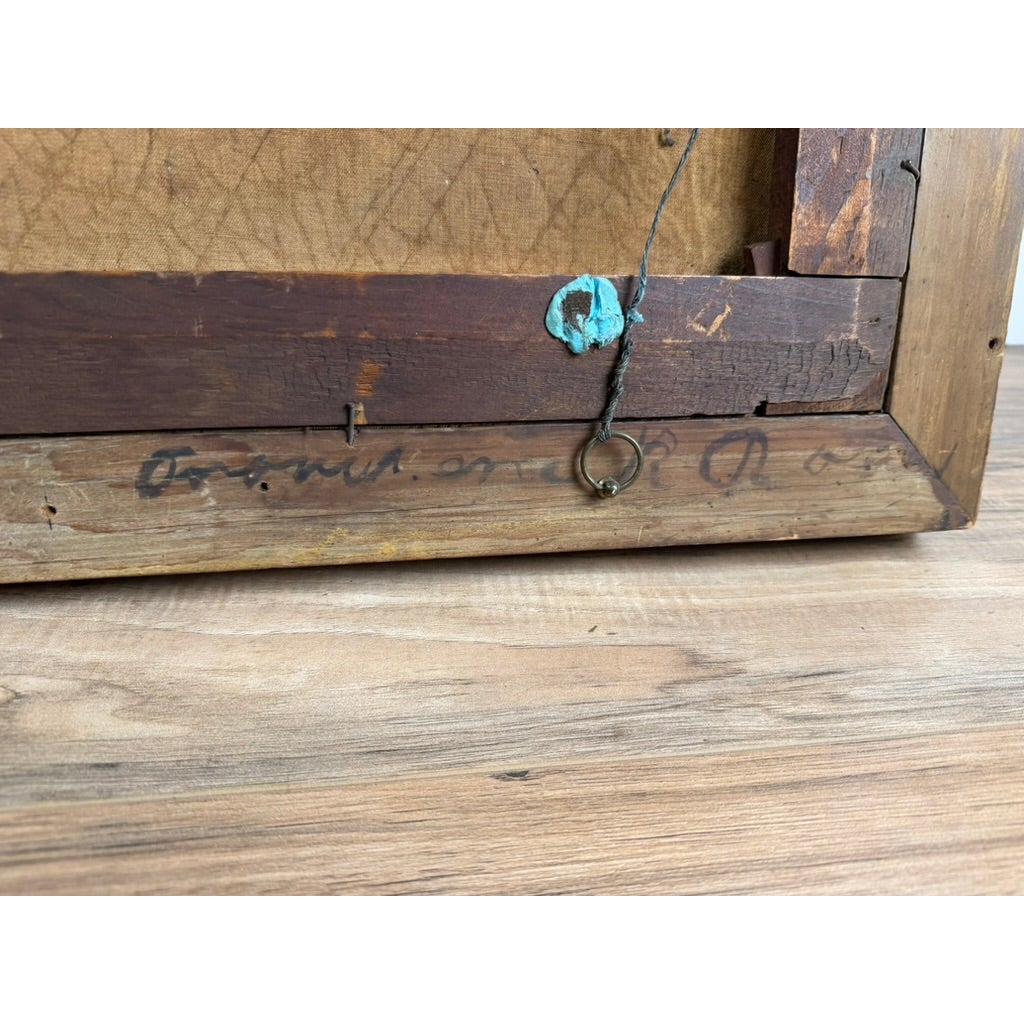 The reverse side of an antique frame from the Pair of American School Oil Portraits of a Gentleman and Lady, c. 1840–1860, showing wood construction, a hanging wire, and handwritten text on the wooden support.