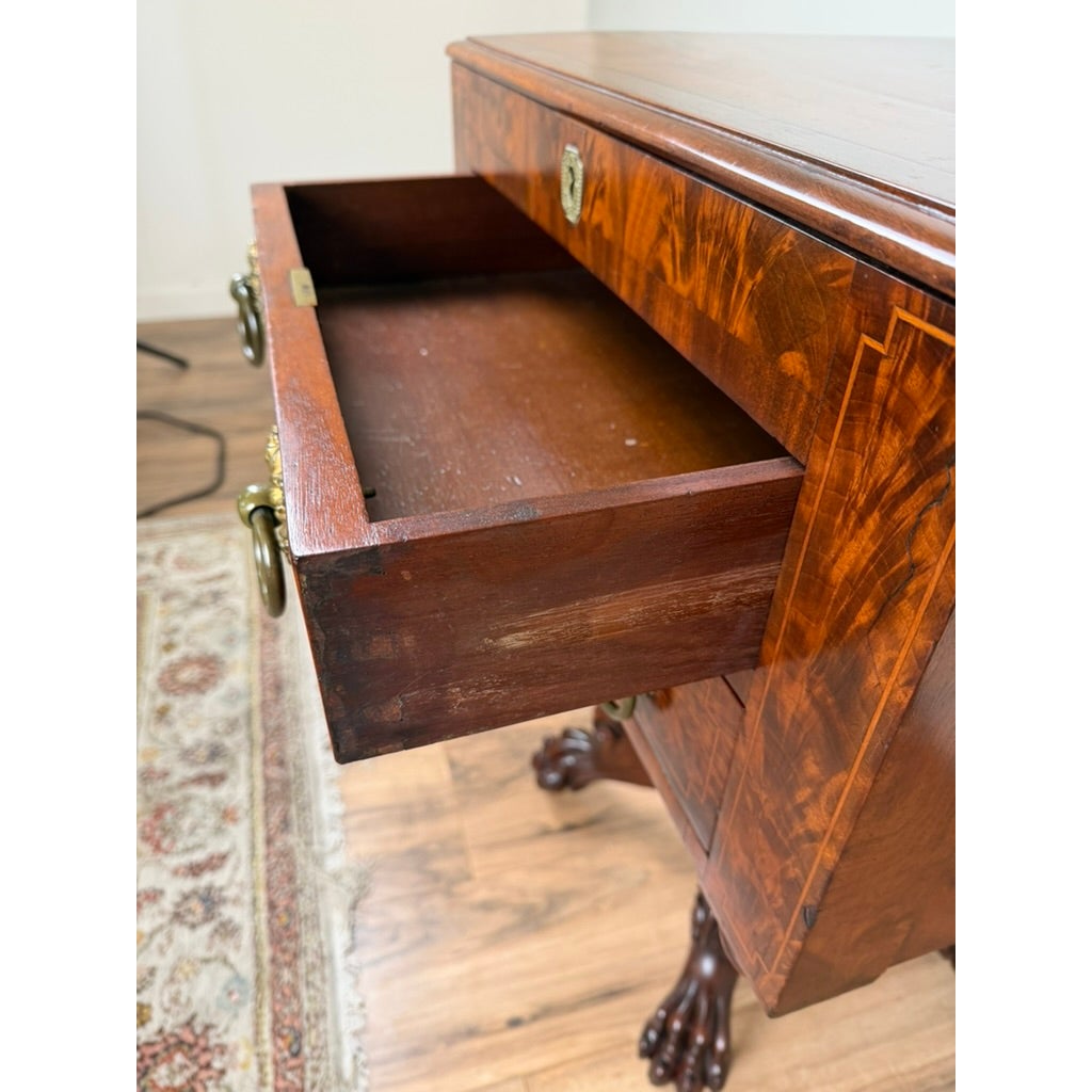 American Classical Figured Mahogany Work Table, circa 1830–1845, featuring a pull-out drawer, brass hardware, and carved claw-foot legs.