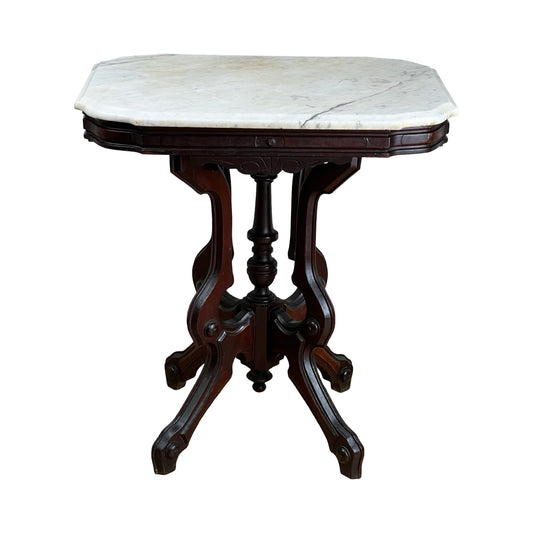 Antique Victorian Marble Top Stand, late 19th century, featuring a shaped white marble top and an ornate dark wooden base with carved details and curved legs. Brand unknown.