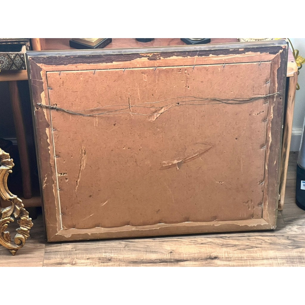 The image shows the back of an Antique Goupil Photogravure “Premier Chapitre” after François-Edmond Outin, Paris, 1897, with worn brown backing, peeling edges, hanging wire, and resting on a wooden floor near ornate furniture.