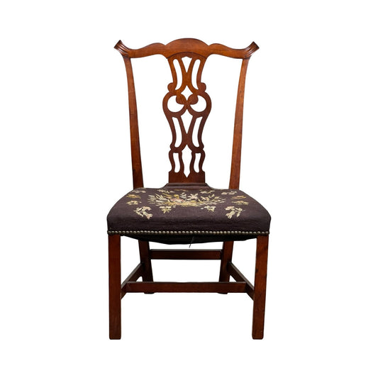 An Antique Chippendale Side Chair with a needlepoint floral seat and pierced splat back, c. mid 19th century, is shown against a white background. Brand: None/Unknown.