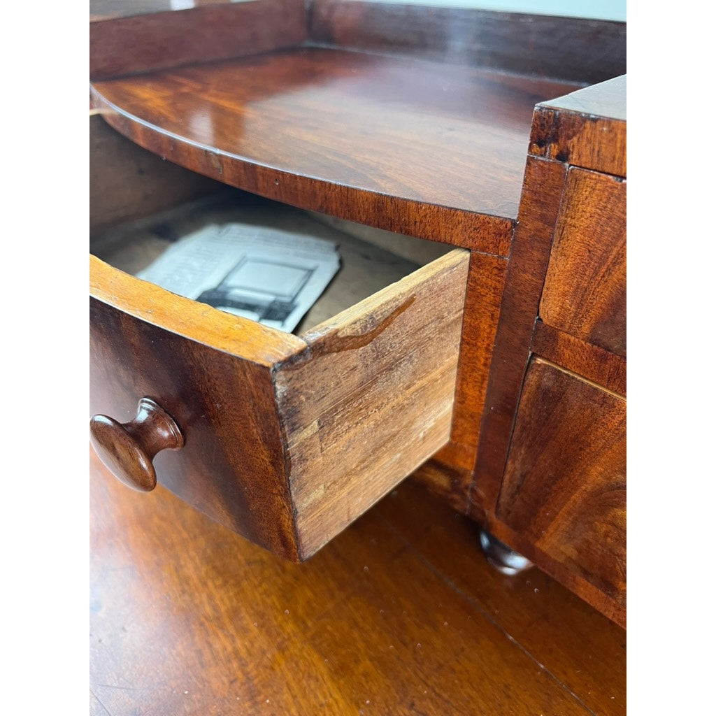 Close-up of mahogany drawers on Federal period shaving mirror