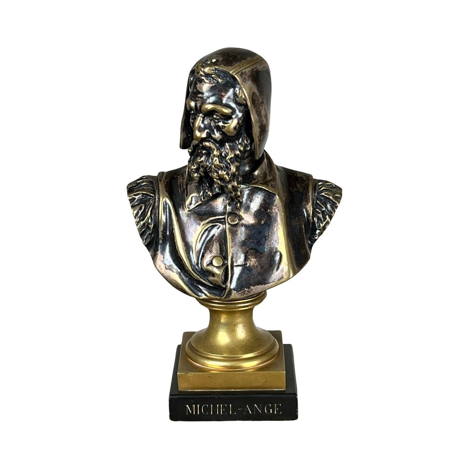 A patinated bronze sculpture of Michelangelo by Albert-Ernest Carrier-Belleuse, modeled in Paris before 1883, echoes the artist's signature refined elegance.
