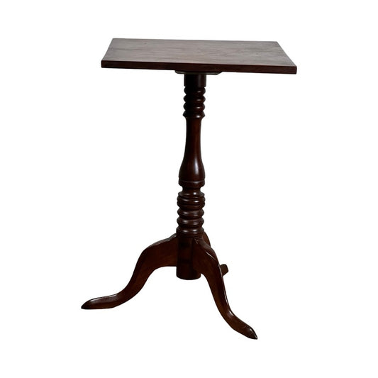 Antique Low Cherry Candle Stand, mid-19th century, featuring a square top, turned central column, and three curved legs with a dark cherry finish, shown against a white background; maker unknown.