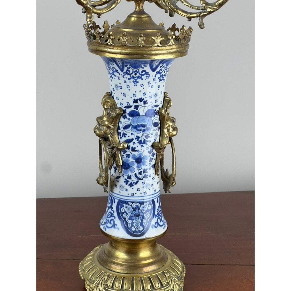 Detail of blue and white Delft decoration on antique candelabra base